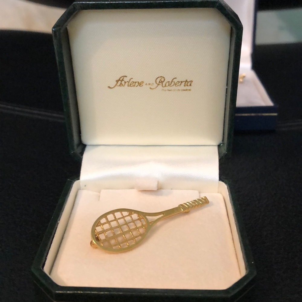 Gold tennis racquet brooche